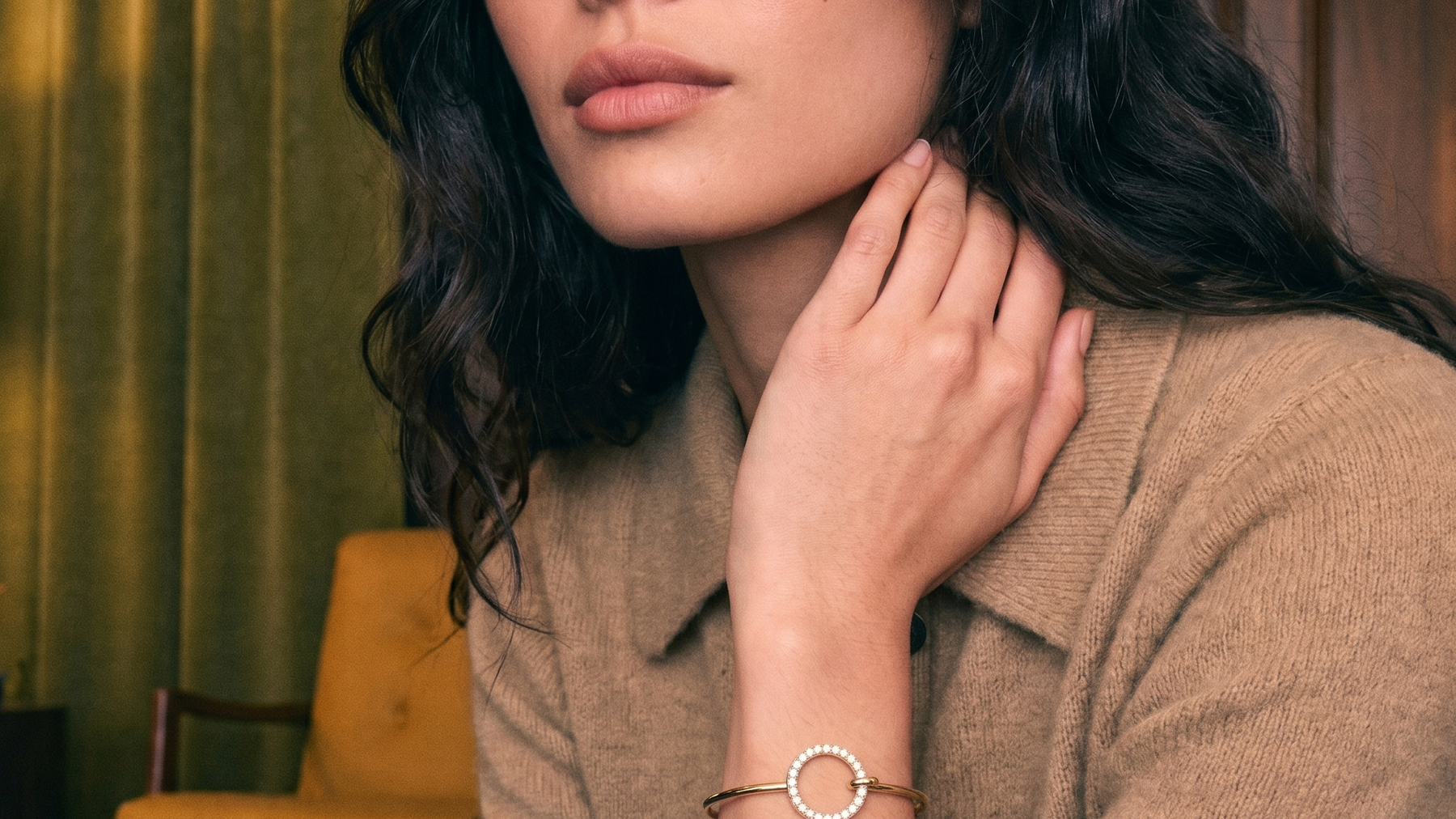 Lab grown diamond tennis bracelet in yellow gold on a woman's wrist