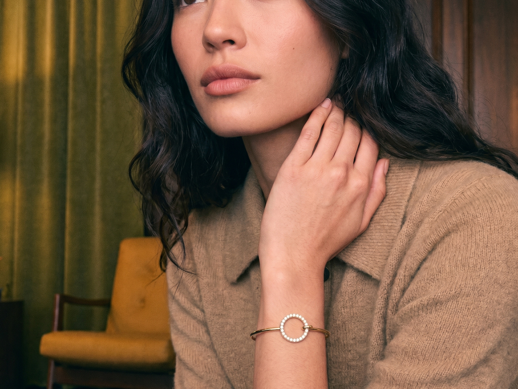 Lab grown diamond tennis bracelet in yellow gold on a woman's wrist