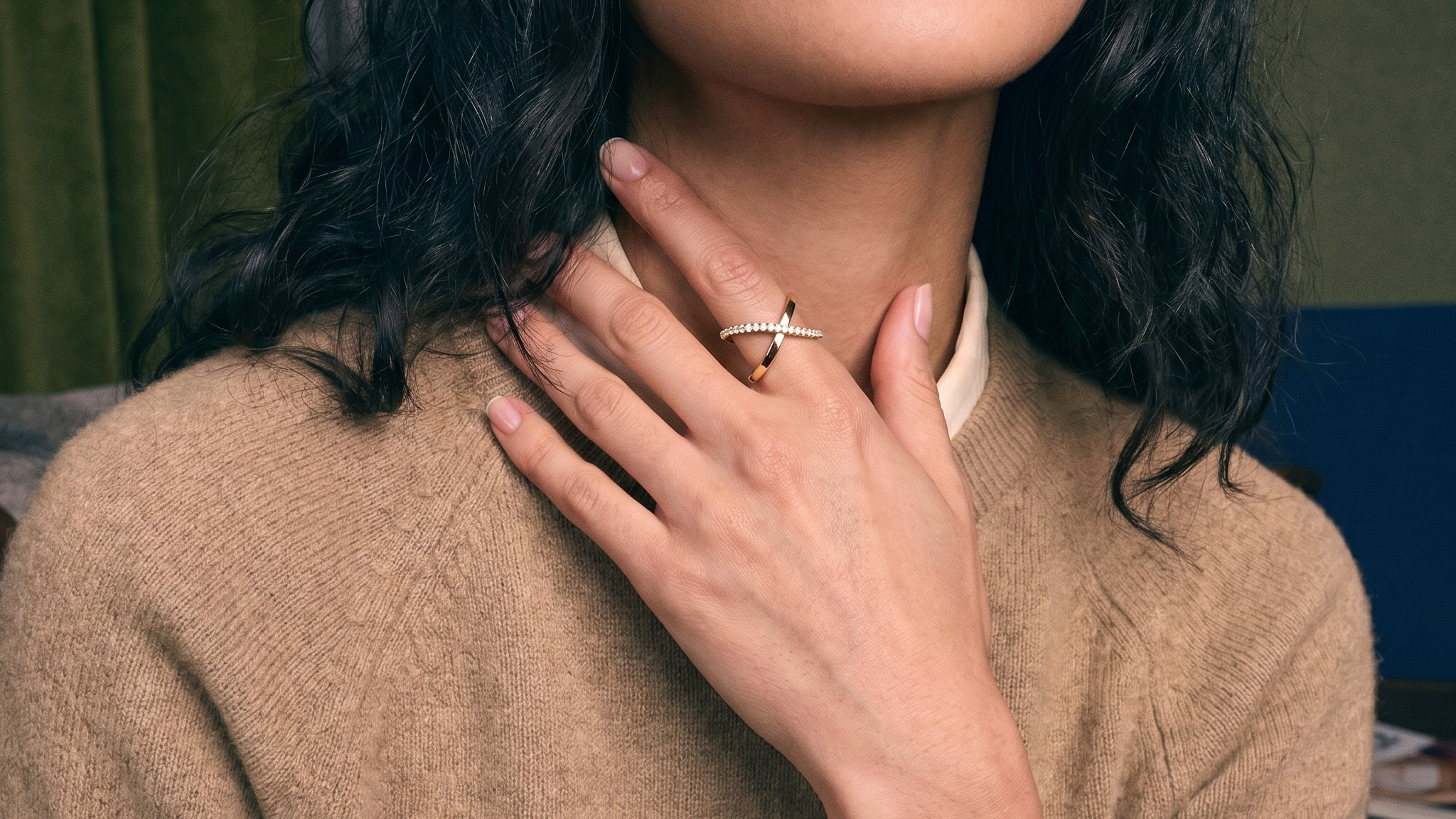 Custom lab-grown diamond engagement ring worn on the hand, close-up in natural light