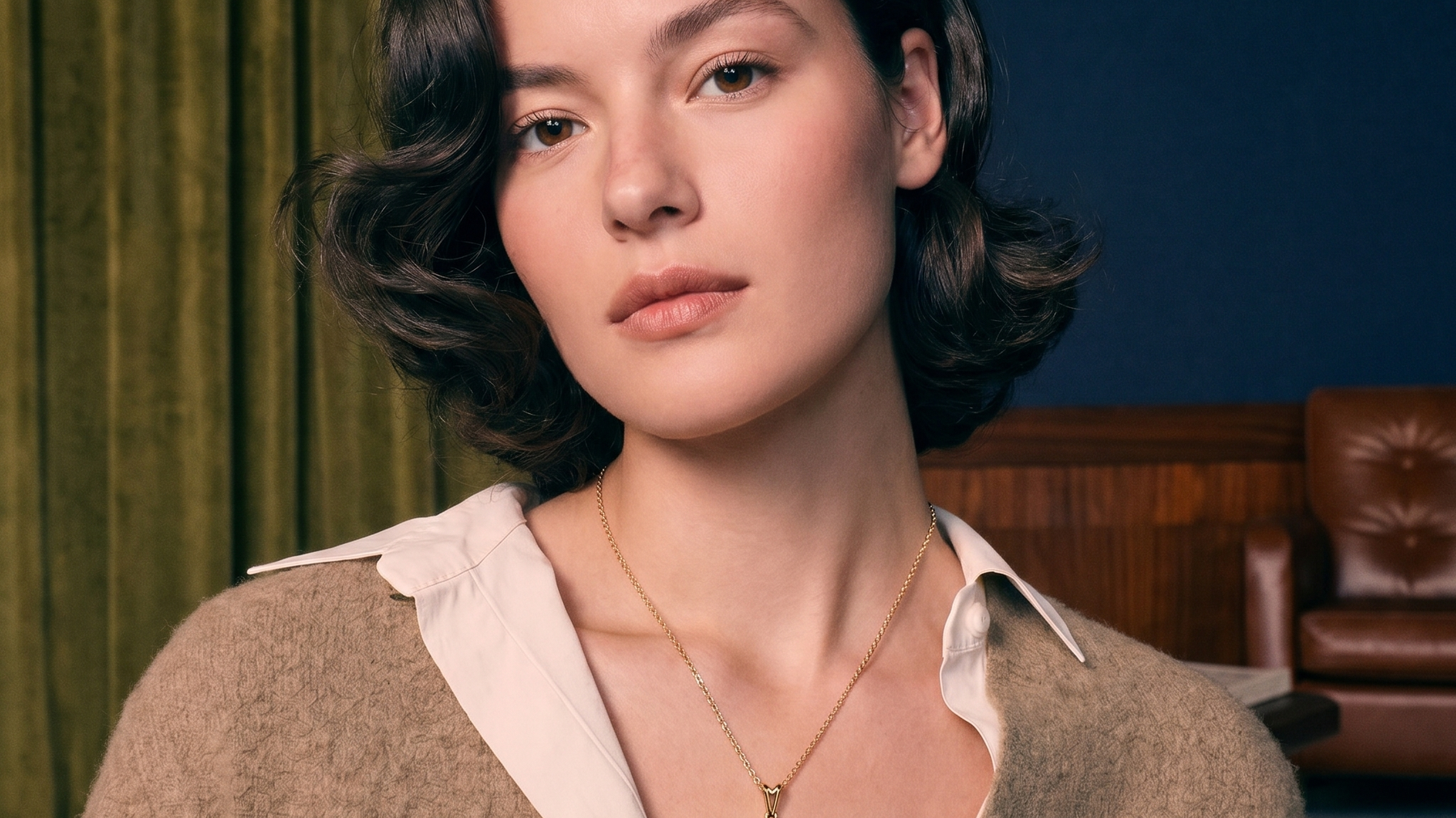 Marquise cut diamonds set in a solid gold pendant styled on a model